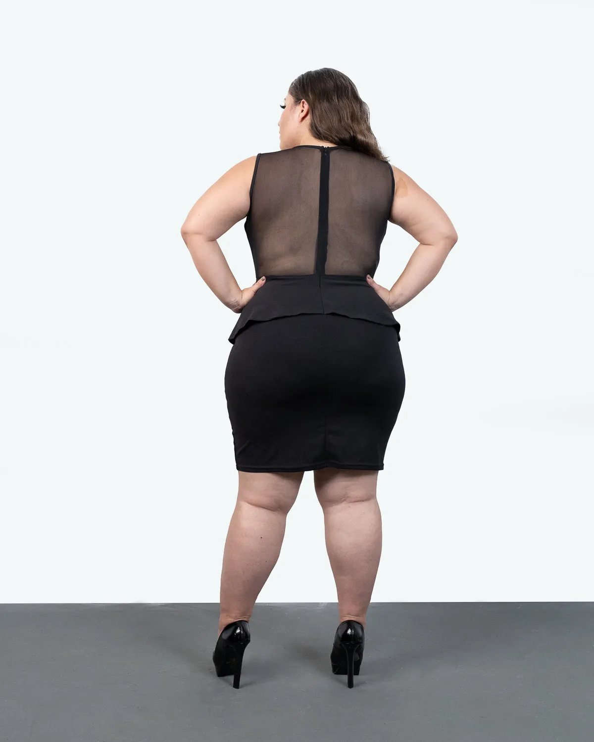 Mesh See-through Sleeveless Peplum Dress.