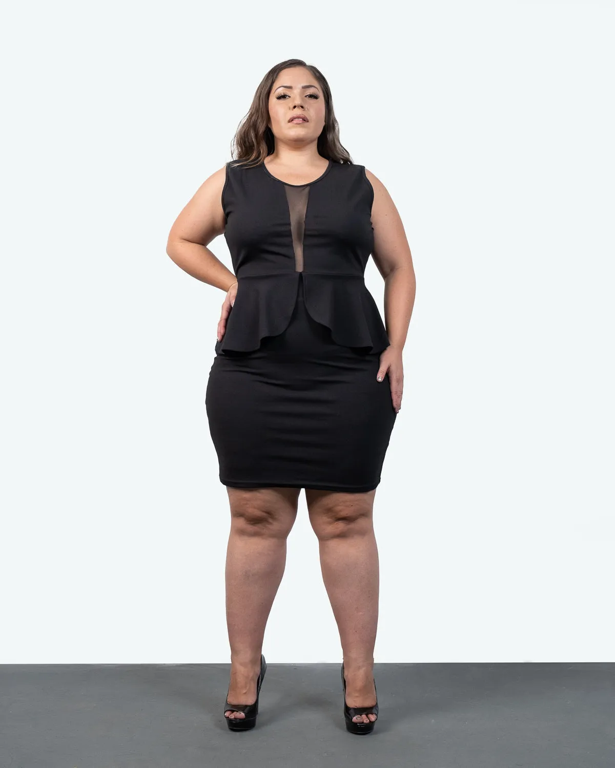 Mesh See-through Sleeveless Peplum Dress.