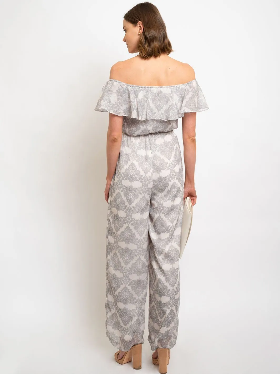 WOMEN'S METALLIC FLORAL PRINT OFF SHOULDER W/ TASSEL TIE IN JUMPSUIT